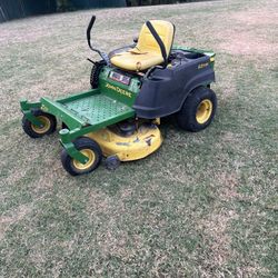 My John Deere 42" starts, but when I release the brakes it shuts off.