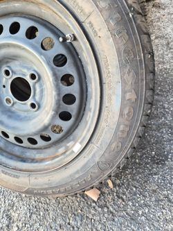 14 Nissan Versa steel wheel