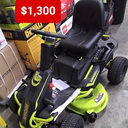Ryobi 48V Brushless 38in 100 Ah Battery Electric Rear Engine Riding Lawn Mower With Battery And Charger 