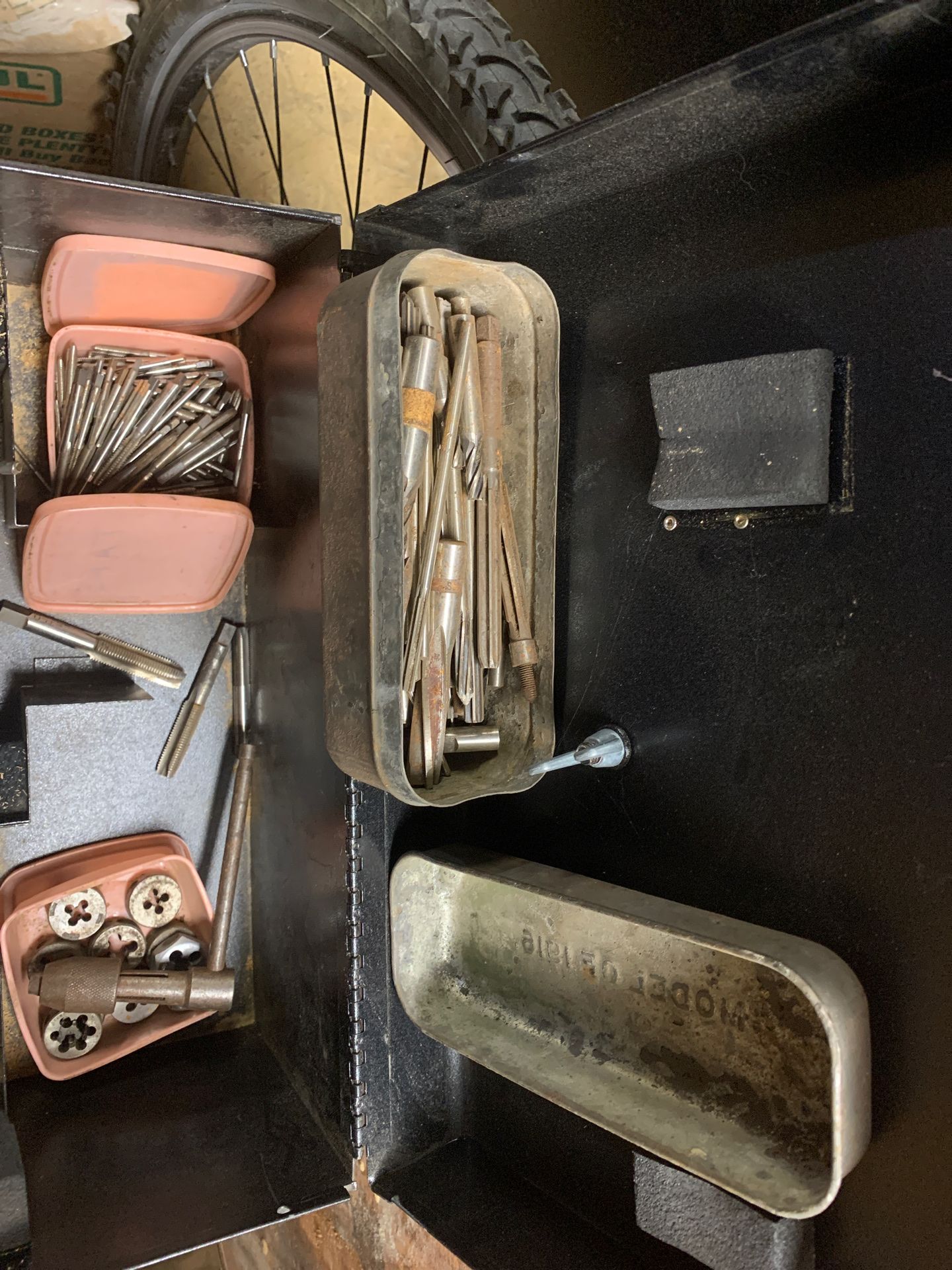 Dewalt saw case filled with taps,dies and handles.