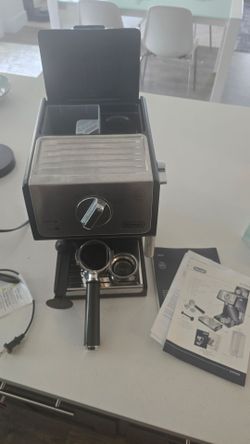 Delonghi expresso machine with milk fother