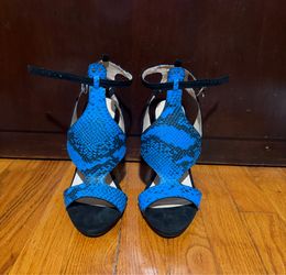 Size 38.5 equivalent to size 7.5/8 high heel sandals.