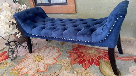 Gorgeous Royal blue velvet tufted bench features an elegant