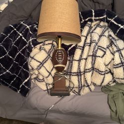 brown lamp with football 