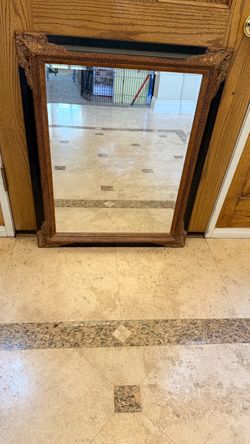 Black and gold mirror