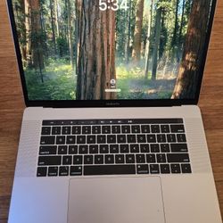 Silver 15" Touchbar Macbook Pro A1990 i7 16Gb Ram 512Gb SSD OS Sequoia