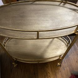 Gold metal serving cart great condition 34.5 inches wide 18 wide 30 tall clean wheels roll great asking 100 