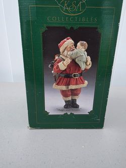 Santa hugs and kisses
Fabriche KsA Collectibles 

