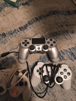 One ps4 cordless remote and two universal remotes