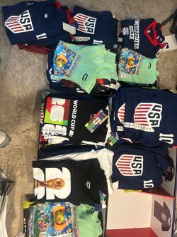 Between 135–140 FIFA World Cup soccer shirts for $3. $3 each or better on all.
