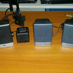 Computer speakers amplified with cords and power supply a/c adapters