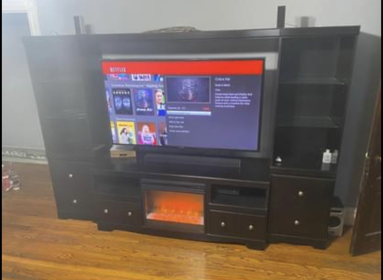 Entertainment Center Can Fit Up To 75”