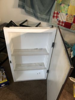 Bathroom mirrior and cabinet! Must sell