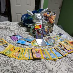Pokemon Cards With Plushy And Sleeves 