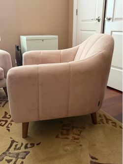 2 pale pink club chairs