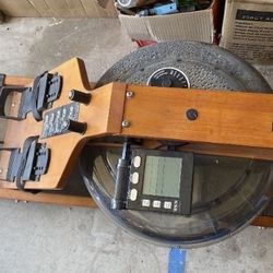 Single rowing fitness machine