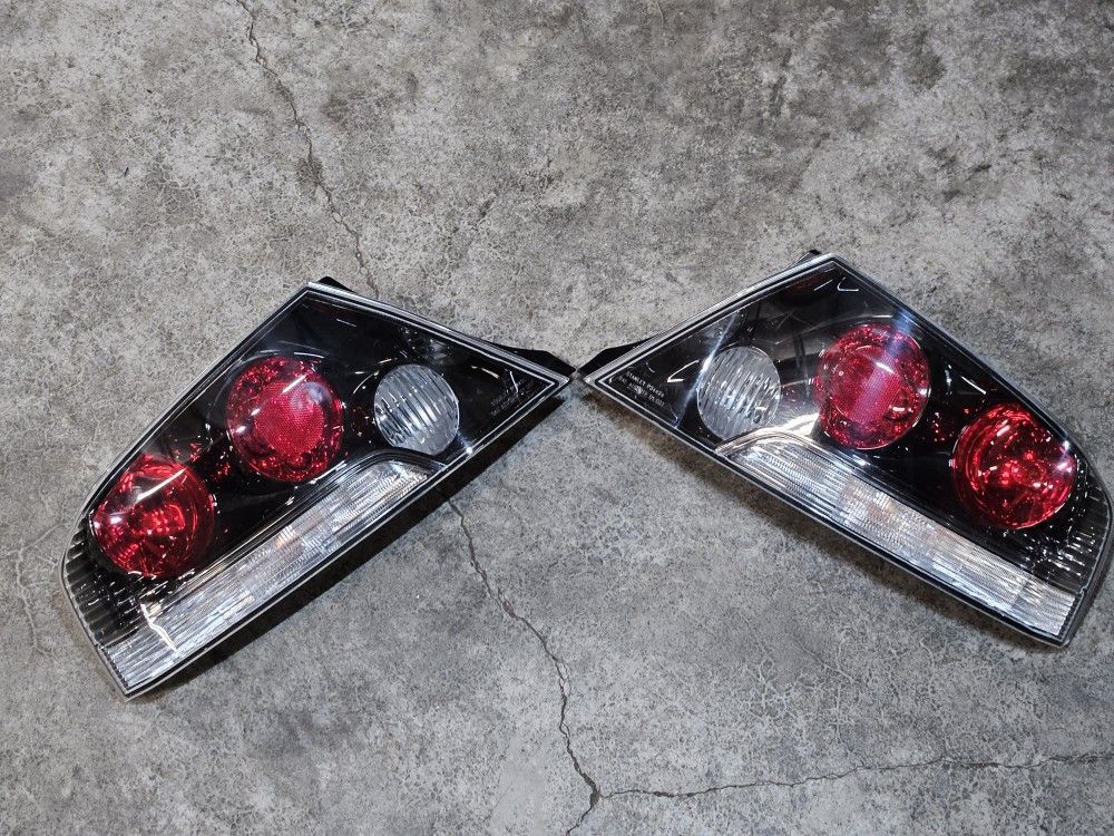 Evo 9 OEM USDM Stanley Tail Lights

