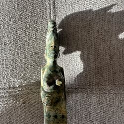 Tribal figure carved in stone/marble