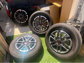 Toyota Tacoma 2024 OEM tires, rims, and lug nuts included