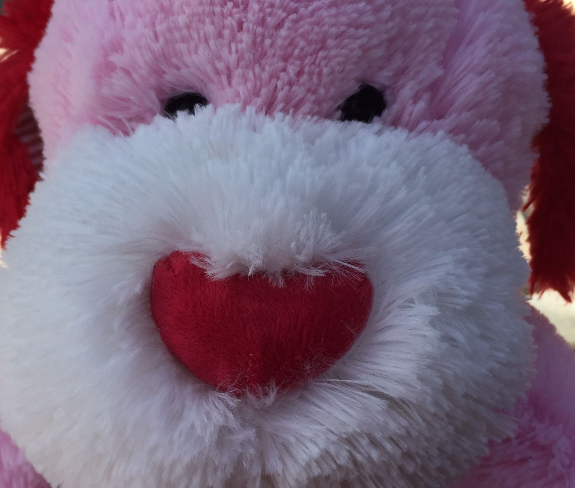 Goffa pink and white plush dog