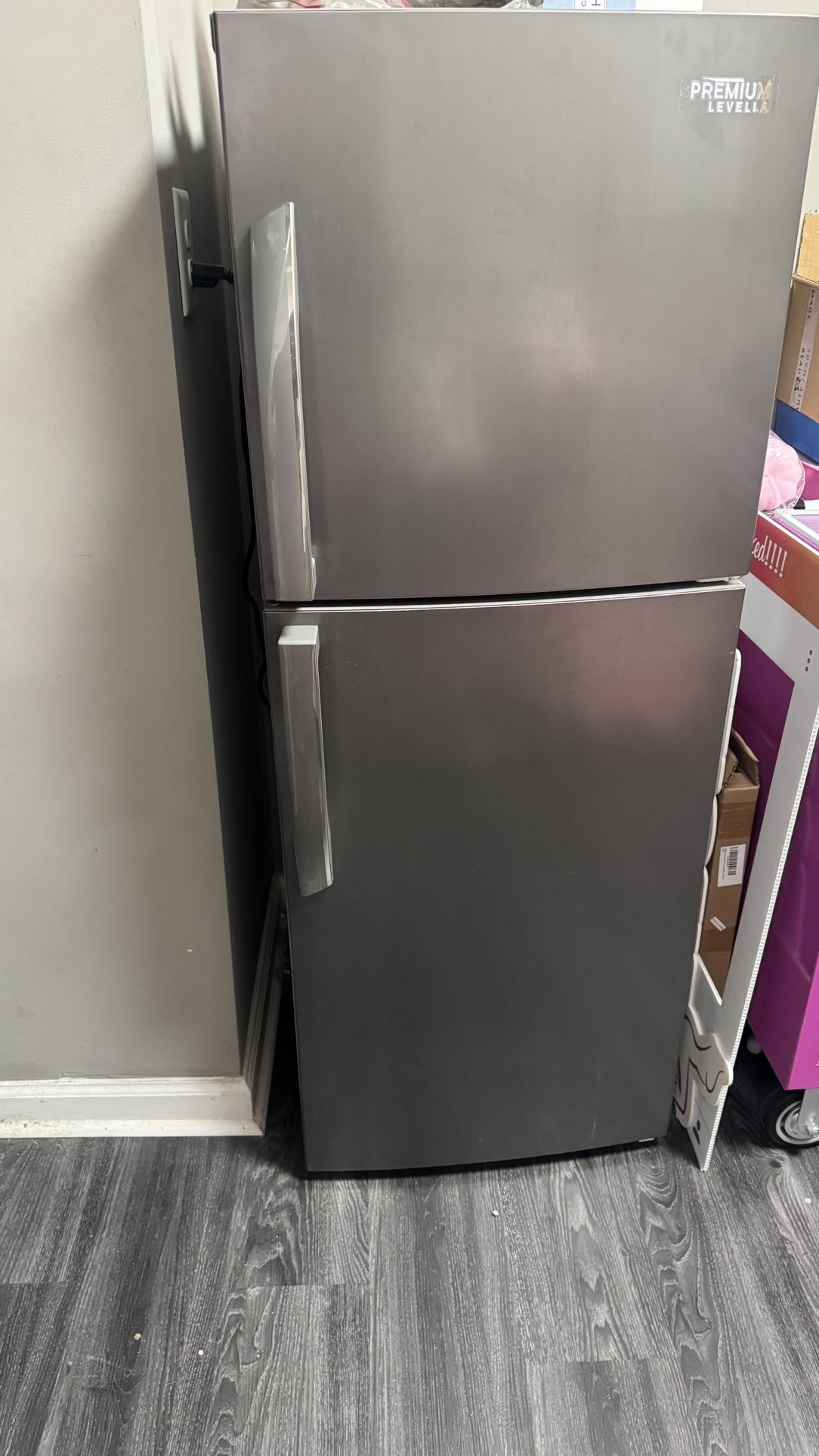 Premium Levella 10.0 Cubic Foot Frost Free Top Freezer Refrigerator with Tilt-Out Can Dispenser and Gallon Door Storage in Stainless Steel Look
