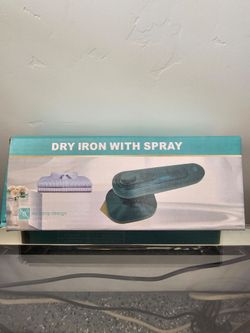 Dry iron with spray
