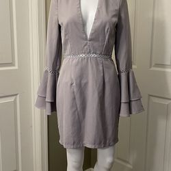 Size 6 lilac dress with ruffled bell sleeves and a plunging V-neck Worn 1x
