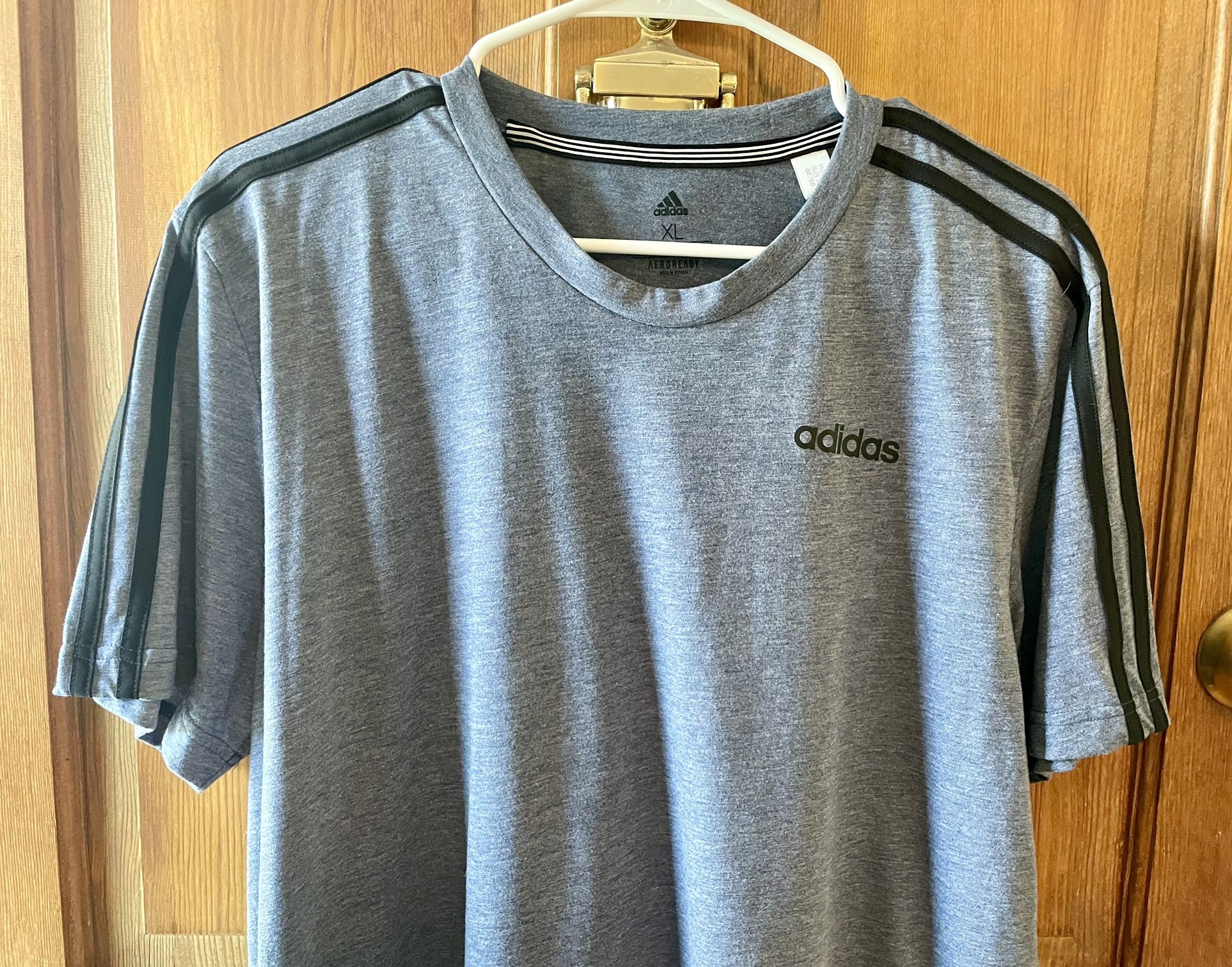 Near New! Very nice men’s Adida athletic shirt,  size XL.