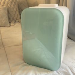 White and blue mini fridge 