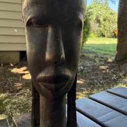 🗿 Hand-Carved African Tribal Bust – Solid Wood  Unique vintage wooden sculpture featuring a detailed tribal face design. Hand-carved from a single pi