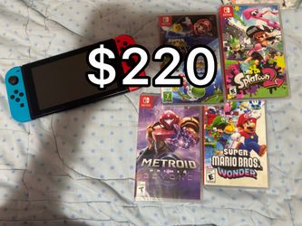 Nintendo Switch + 4 GAMES INCLUDED