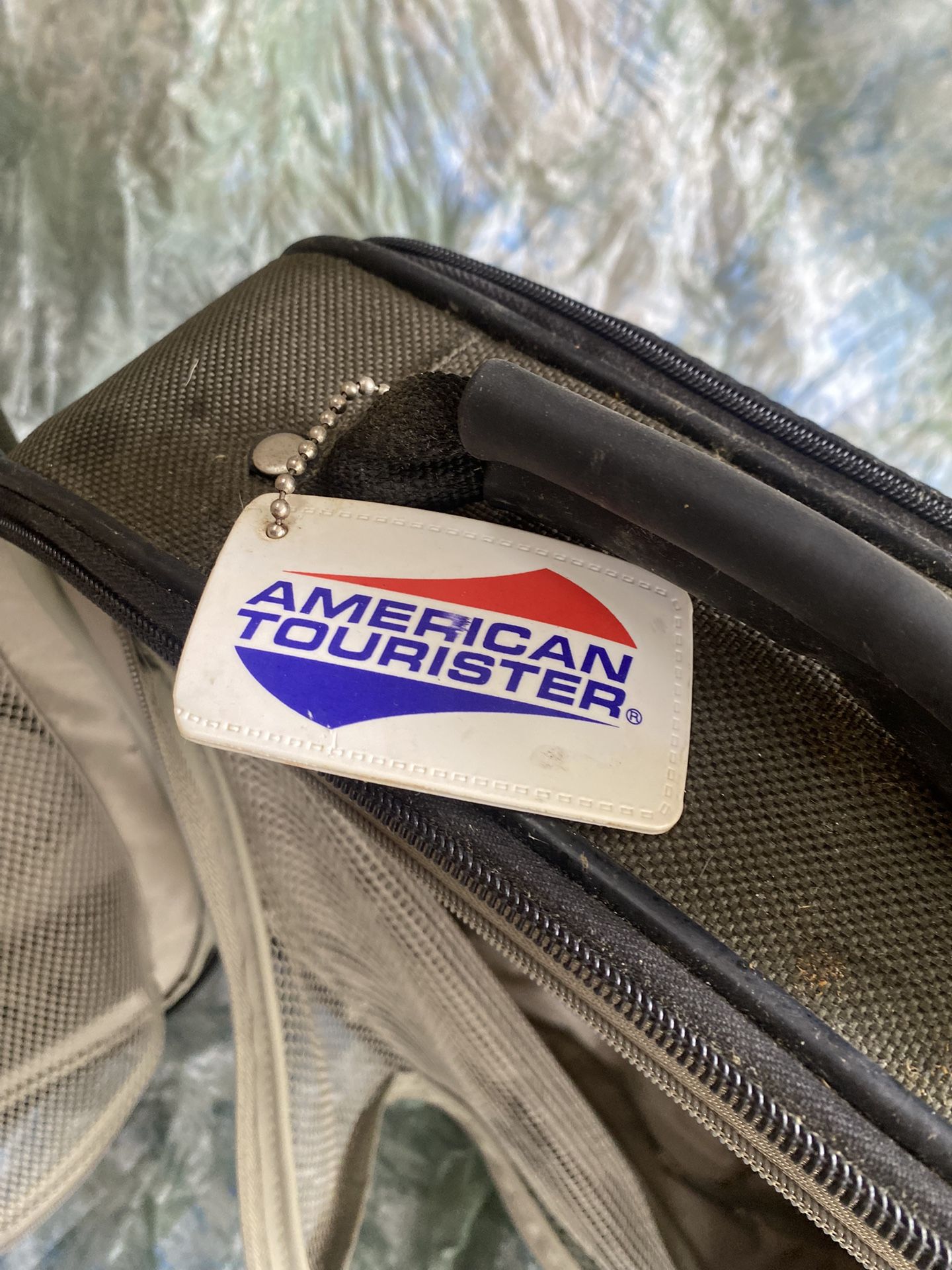 American Tourister carry-on luggage