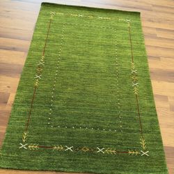 Grass green gabbeh wool rug