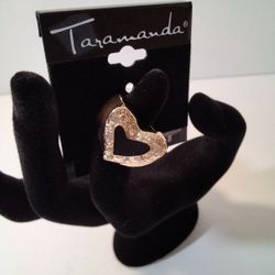 Brand New Heart Shape Ring Thats Gold Colored With Diamond Like Stones .   Size. 8"  .