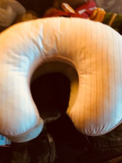 Boppy pillows and one breastfeeding pillow
