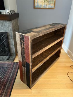 Handmade bookshelf clad in reclaimed wood