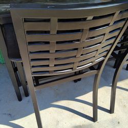 Glass Top Metal Table And 6 Chairs