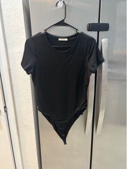 Ladies, black bodysuit size large