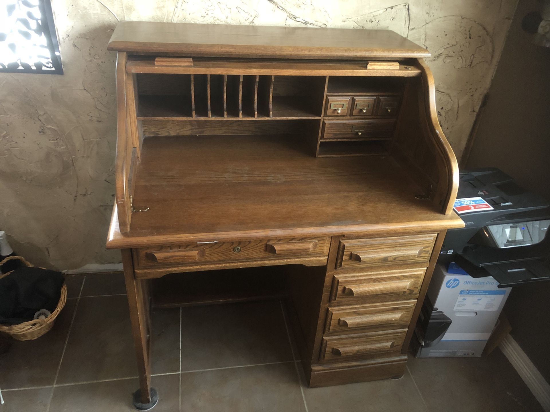 Oak Creek by Riverside roll top desk. 37"l x 27"w x 40"h. Solid Wood