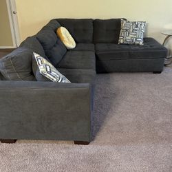 Gently Used Sofa Sectional, Rug and Curtain Panels