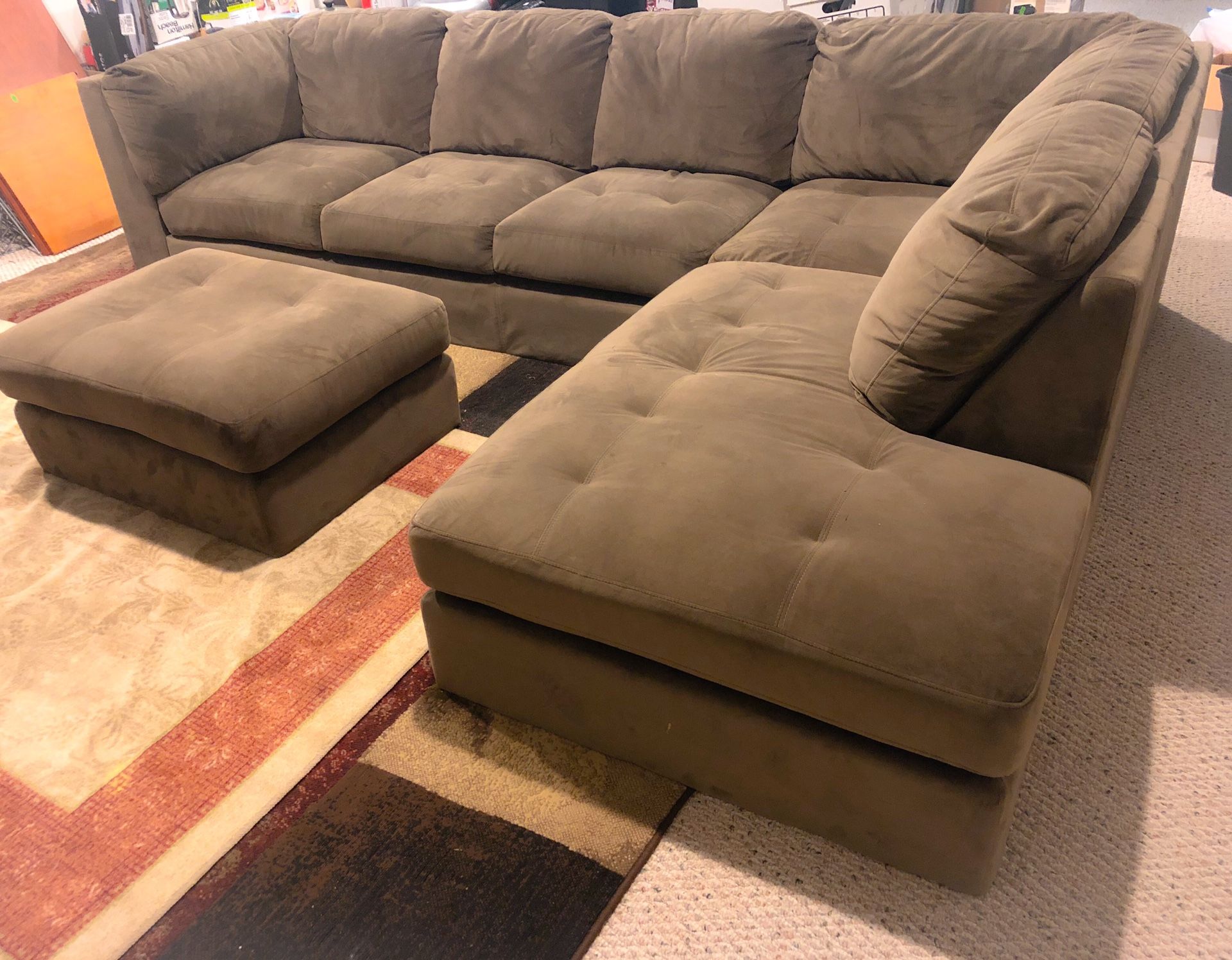 Like new fabric sectional sofa / couch with ottoman bought from Costco