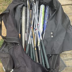 Bag Of Golf Clubs And Baseball Bats