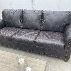 leather sofa ashley select furniture 
