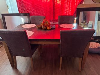 Black marble dining table for 6 people.
