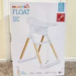 Brand New In Sealed Box Munchkin Foldable High Chair