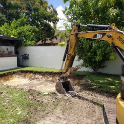 Bobcat and Excavator 
