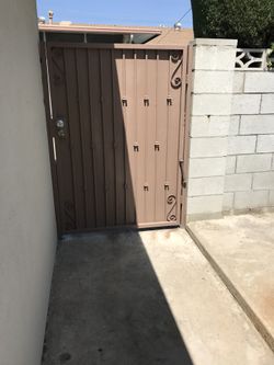 Custom metal and wood gates and fences
