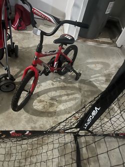 Little boys bike with training wheels never used