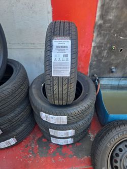 NEW TIRE 195/65-15