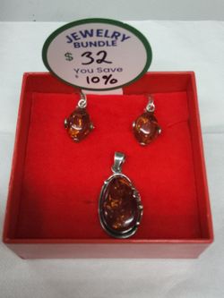 Amber and silver earrings and pendant